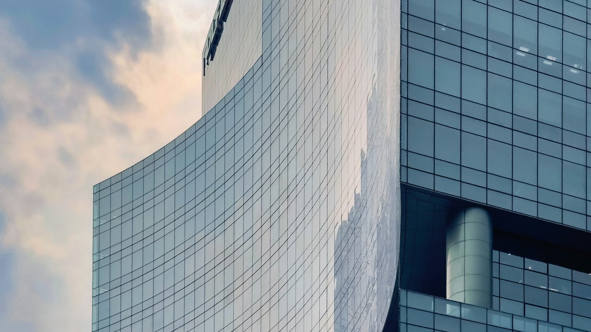 Modern office building exterior at dusk